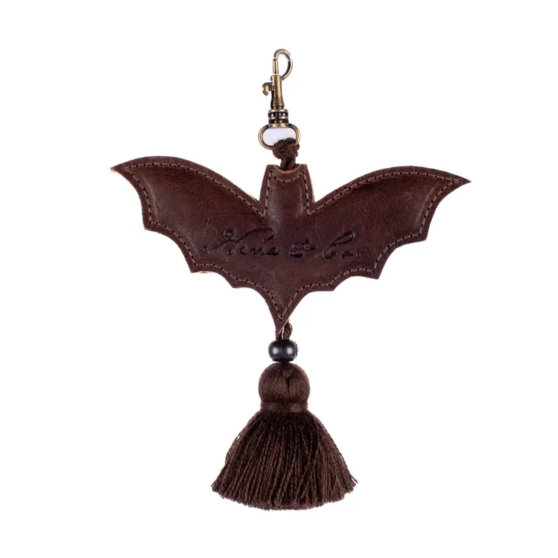 BAT CHARM WITH TASSEL - BARREL BROWN