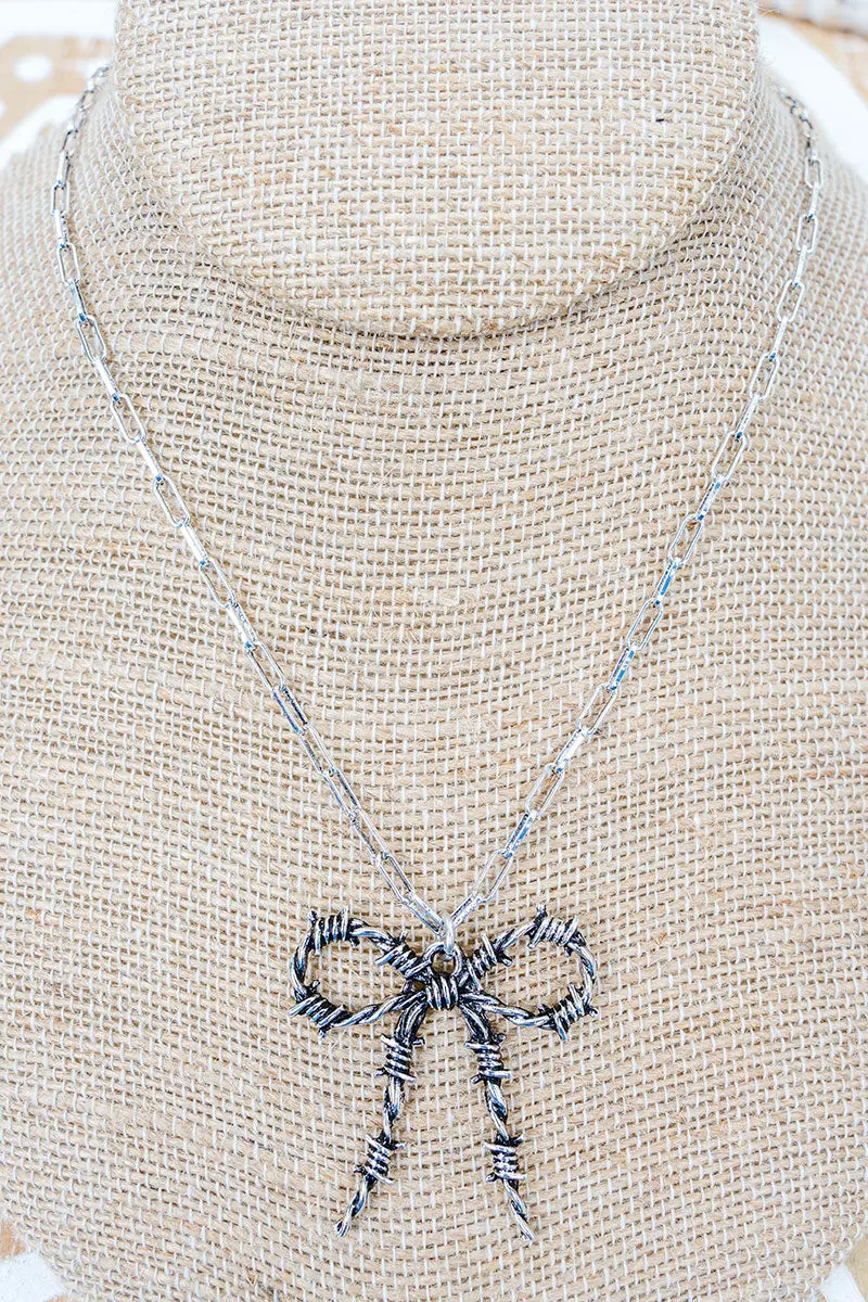 Briarcrest Bow Silvertone Necklace