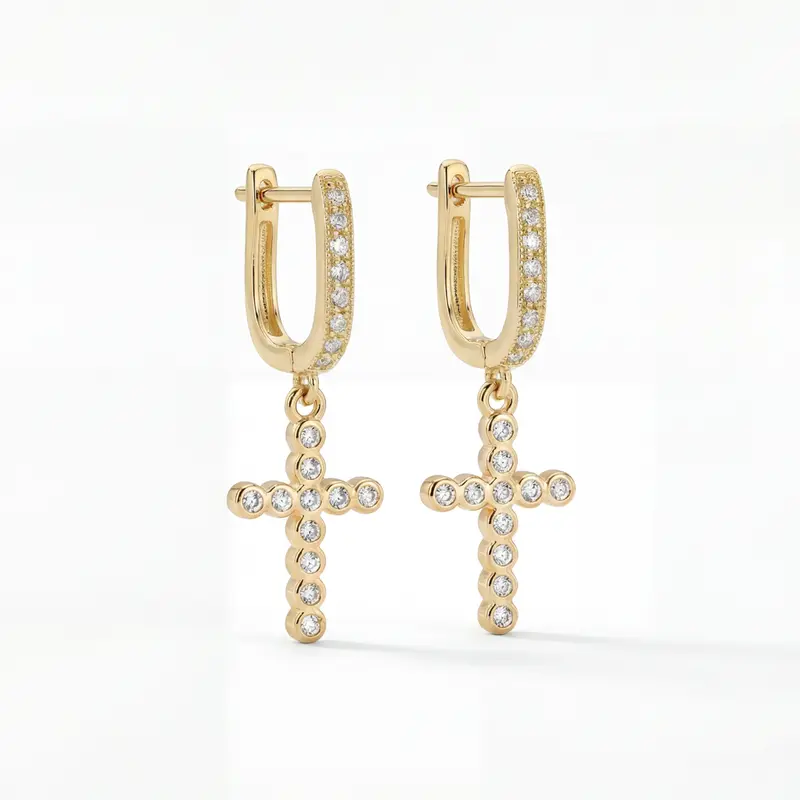 Frankie Cross Huggie in Gold
