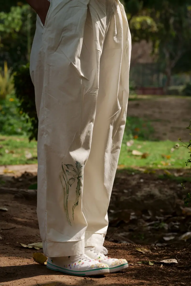 Ivory pleated pants