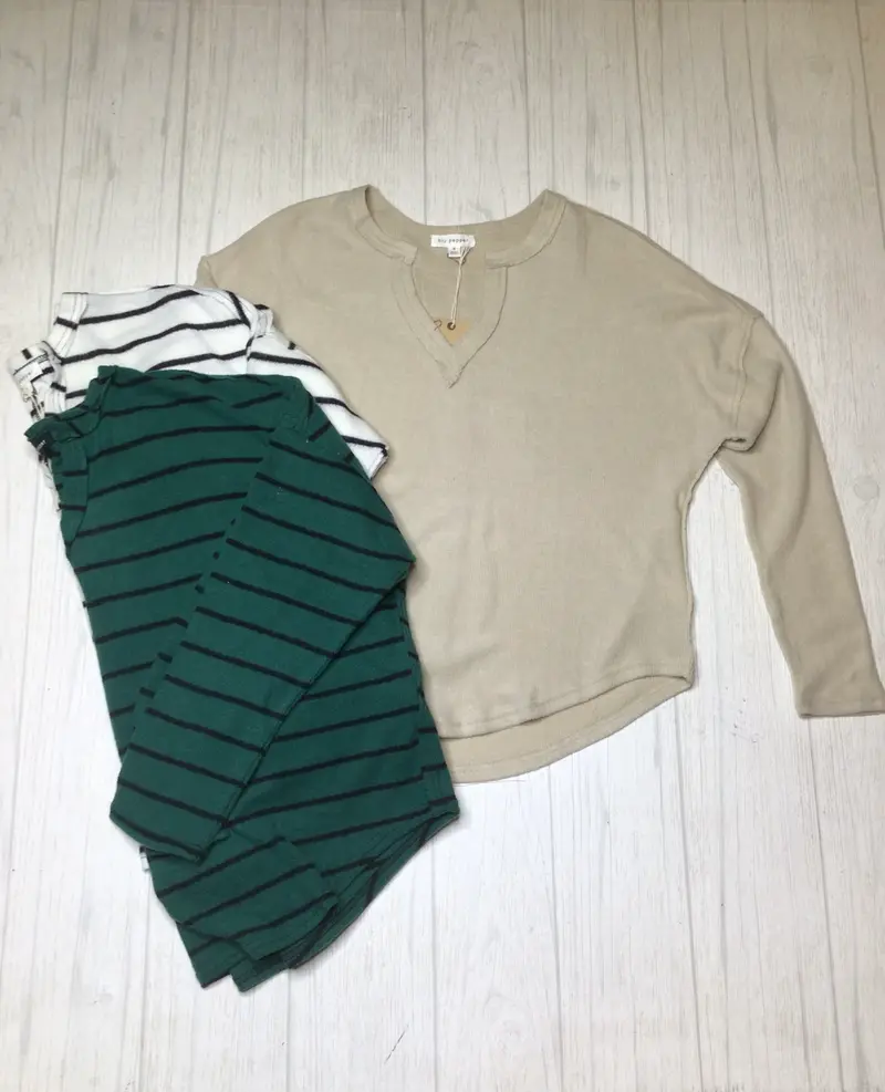 Striped raw edge split neck top
